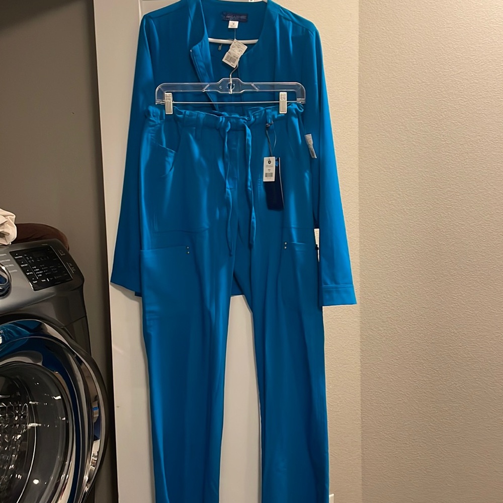 Scrubs set. Brand Koi. Brand new! Tags still on scrubs.